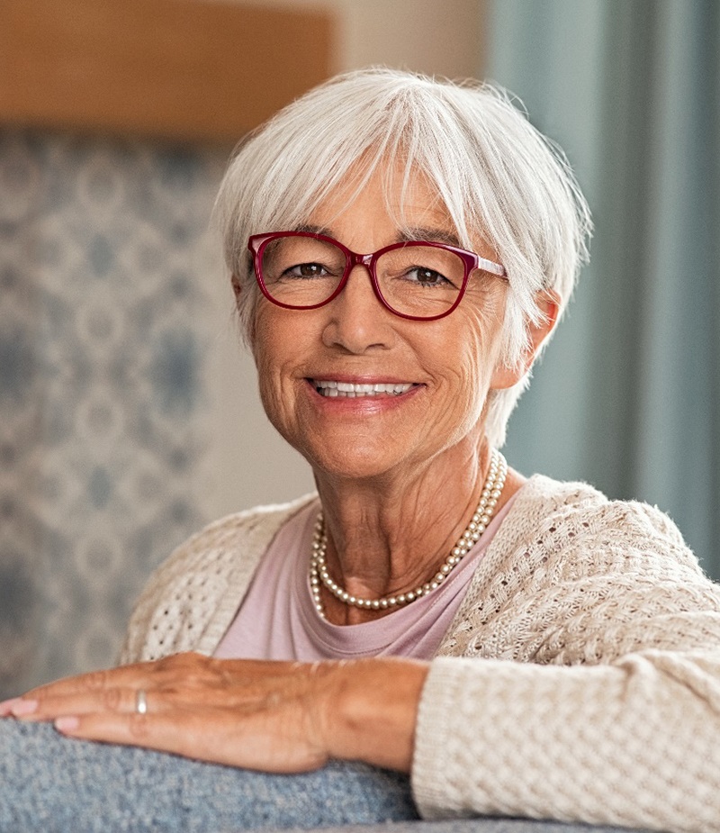 Senior woman enjoying the benefits of All-on-4 implants