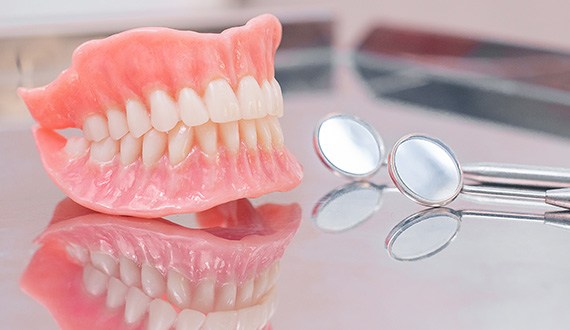 If you are missing many teeth, you may qualify for dentures